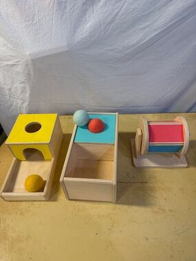 LOVEVERY Interactive Ball Drop and Roller Toy Set in Yellow, Teal, Red and Blue